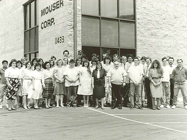 1973 Mouser employees standing in front of Mouser Corp building photo